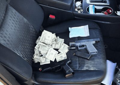 Guns, drugs, and weapons are found in a vehicle by Santa Maria Police Officers